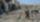 Un membre de la "Badri 313", unité d'élite des talibans, parmi les débris de lex-base de la CIA près de Kaboul, le 6 sep. 2021 © D. R.